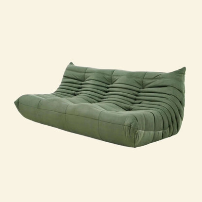 Matcha-green replica of the velvet Togo-style 3-seater sofa  – low, frameless design with plush channel tufting