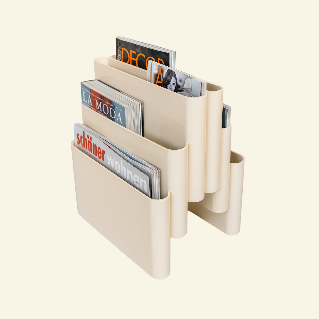 Beige retro cascade magazine holder rack with multiple magazines on a white background