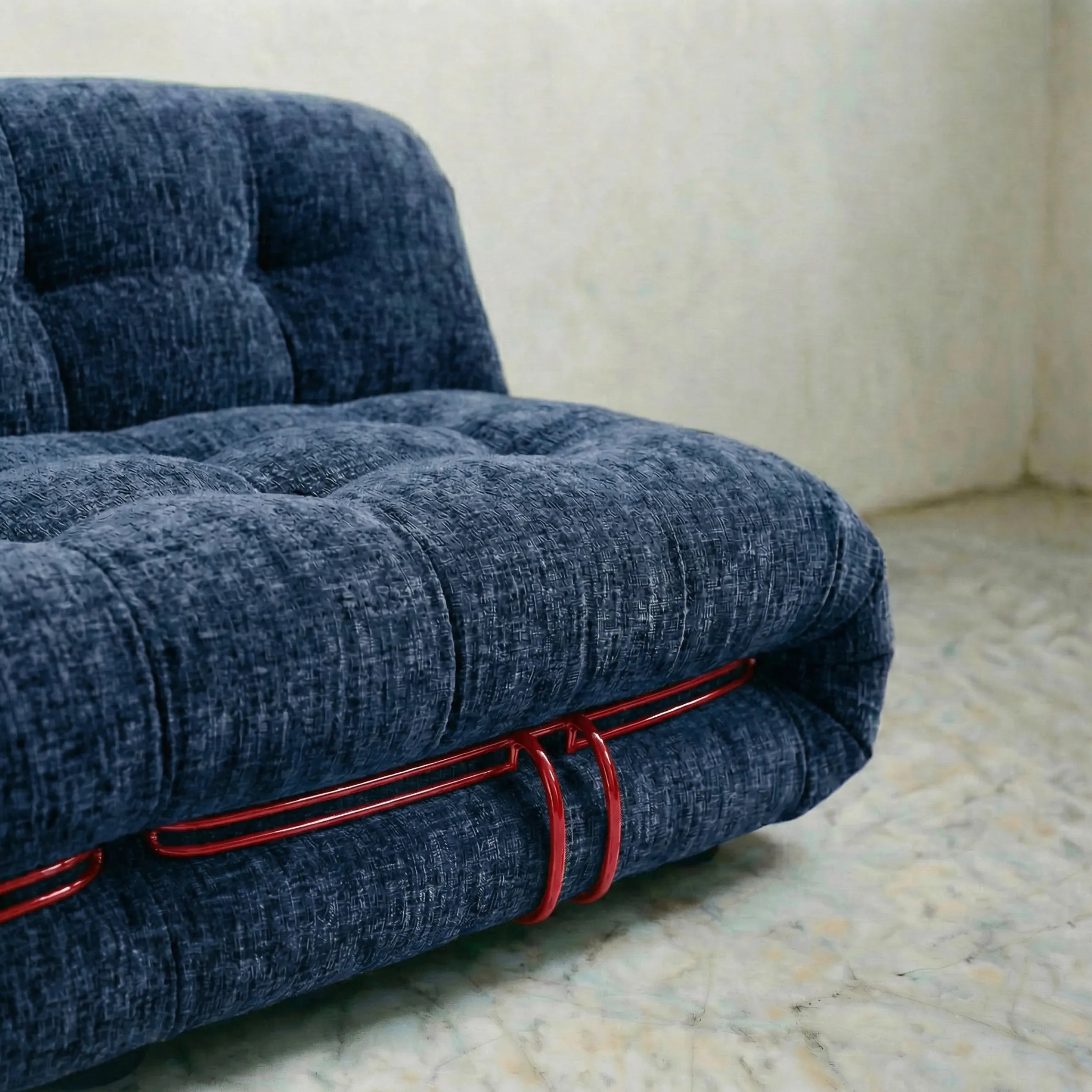 soriana sofa 3-seater dupe in blue chenille with red chrome bar close-up with chrome frame detail on light gray surface