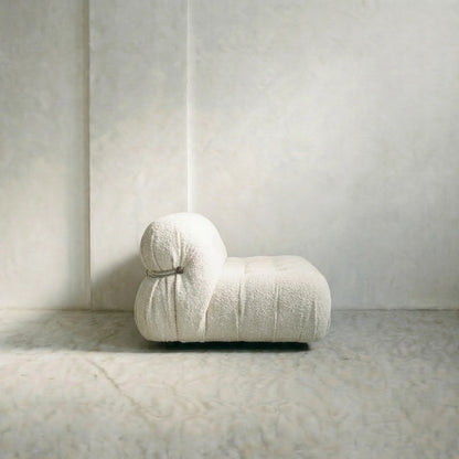 soriana sofa 2-seater dupe in white bouclé on gray floor with white wall background