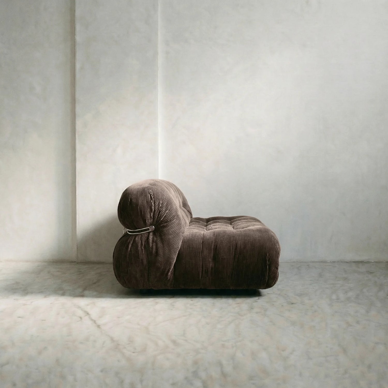 soriana sofa 2-seater dupe in chestnut corduroy close-up with chrome frame detail on light gray surface