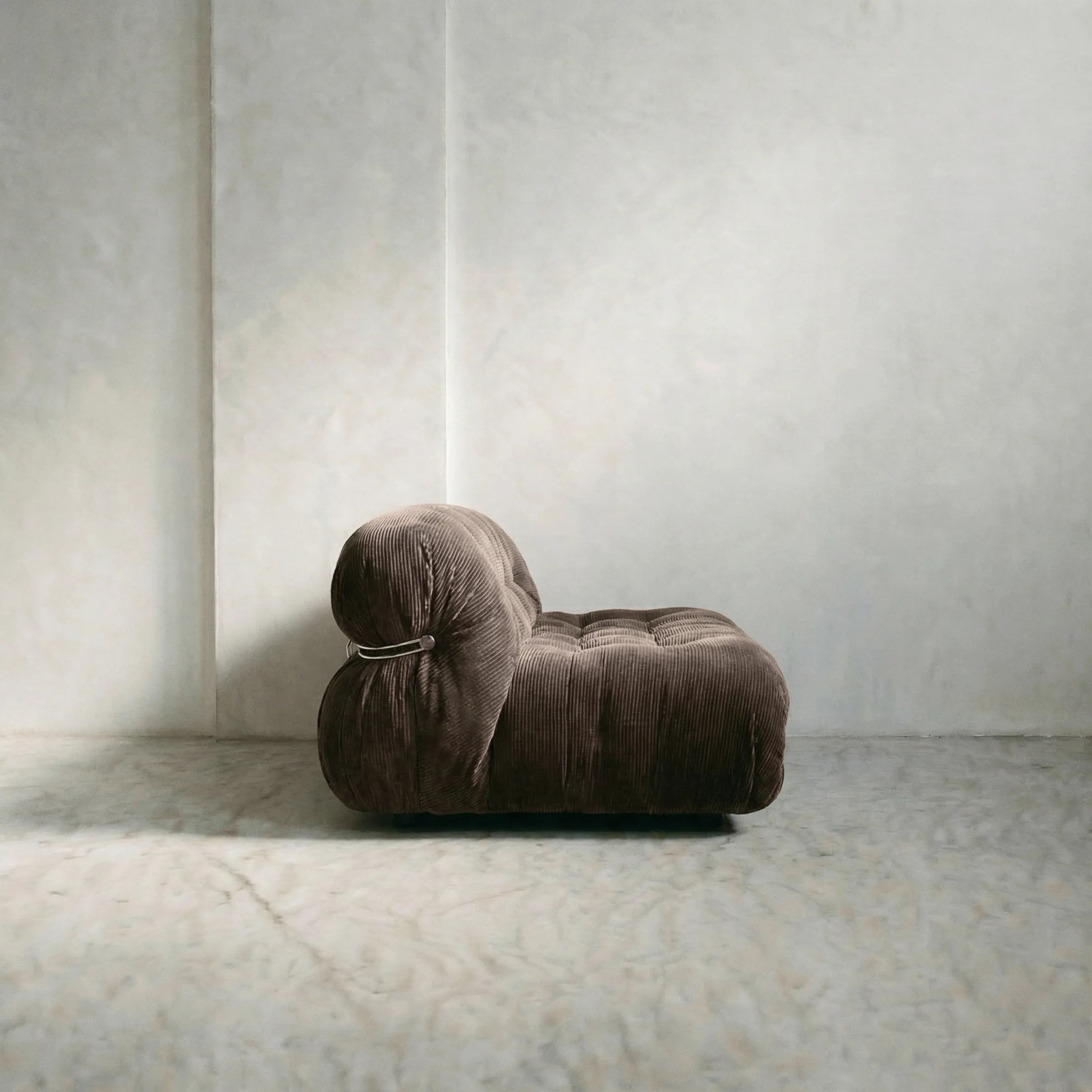 soriana sofa 2-seater dupe in chestnut corduroy close-up with chrome frame detail on light gray surface