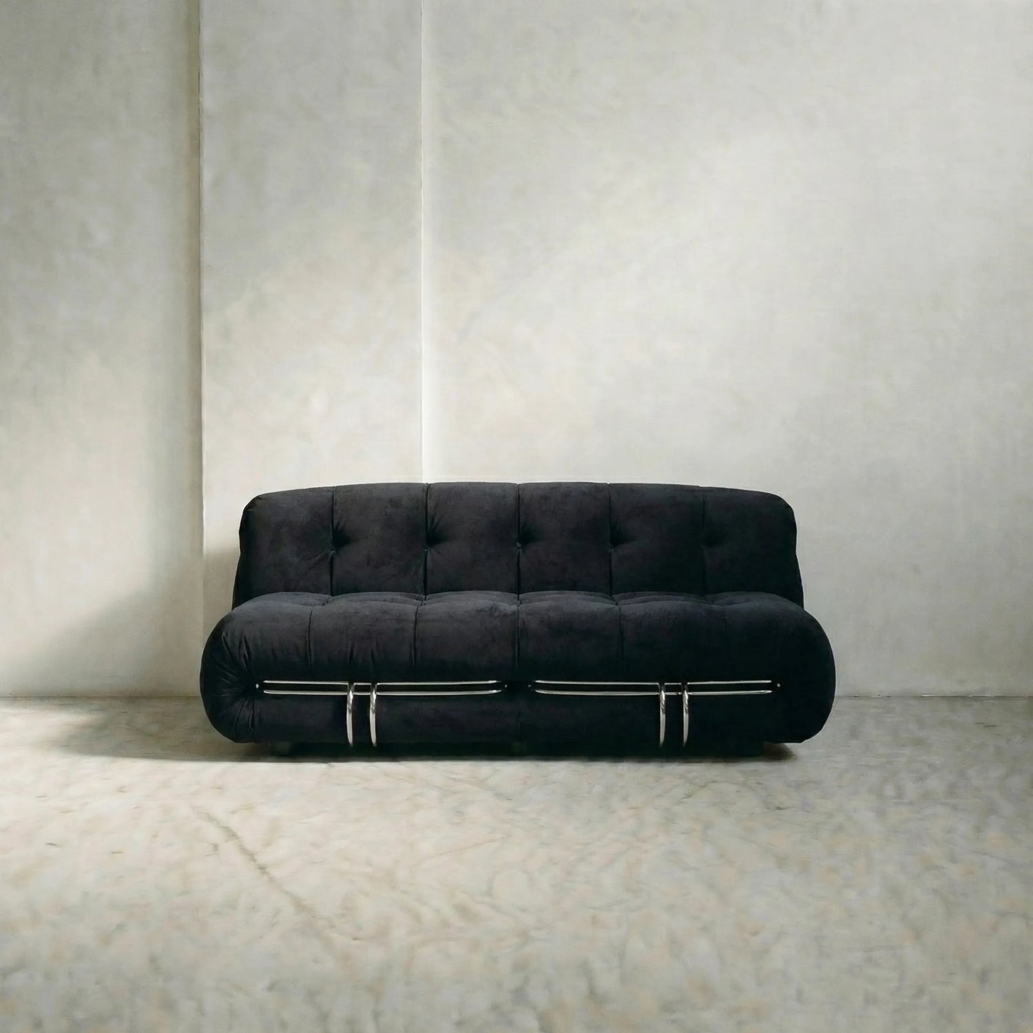 soriana sofa 2-seater dupe in black flannel close-up with chrome clamp detail on light background
