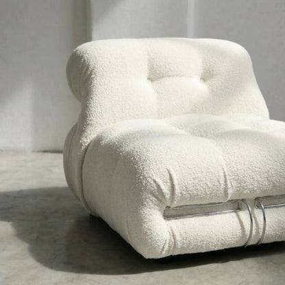 soriana chair dupe in white bouclé close-up with chrome clamp detail on light background