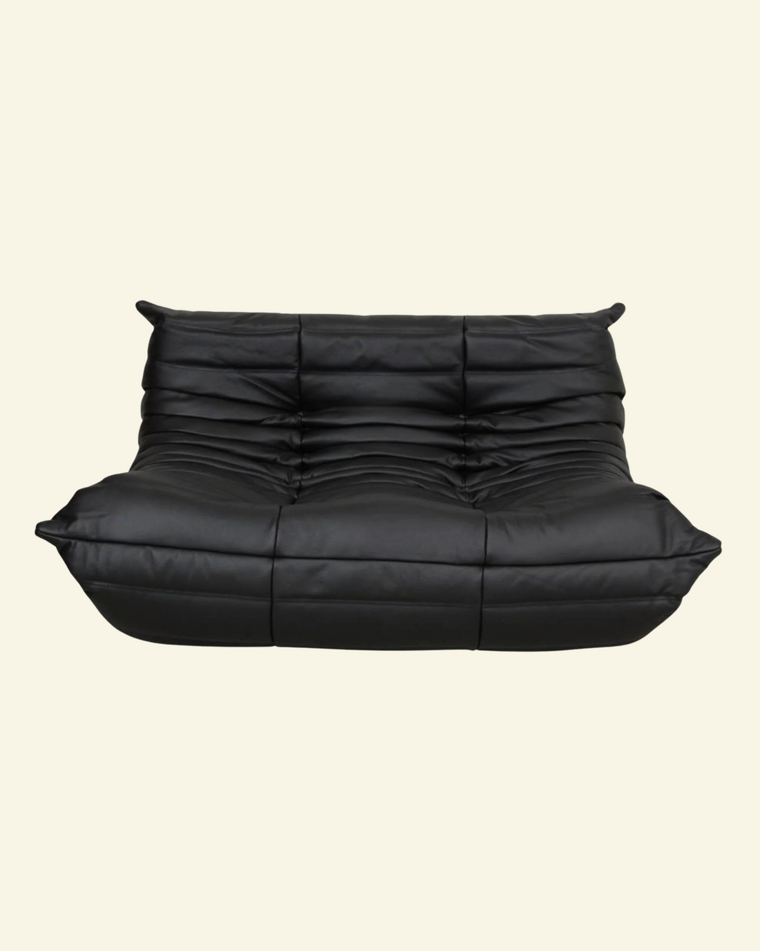  Togo black leather 2-seater dupe  on a beige background
