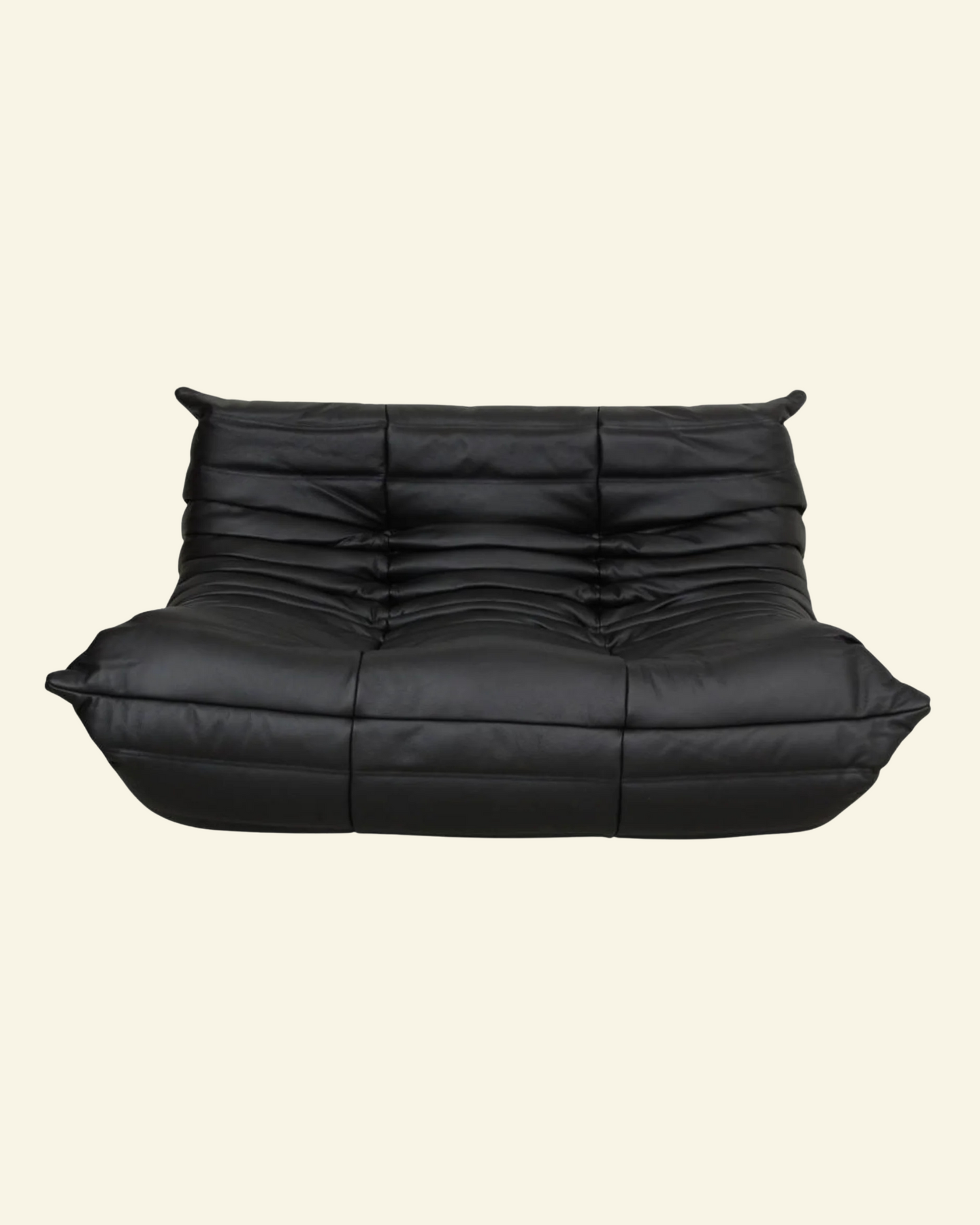  Togo black leather 2-seater dupe  on a beige background