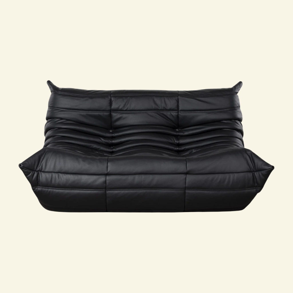 Black leather 2-seater dupe on a beige background