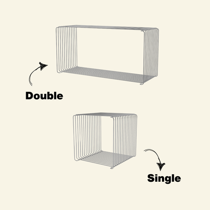 Modern wire side table extended made of chrome, shown on a minimalist beige background. Stackable cube design with clean geometric lines.