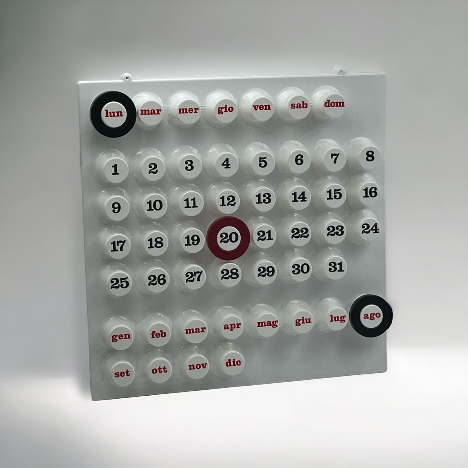 White Perpetual Ring-a-Date Calendar in Italian design, available in white, green, and yellow — a stylish, eco-friendly wall calendar for modern interiors.
