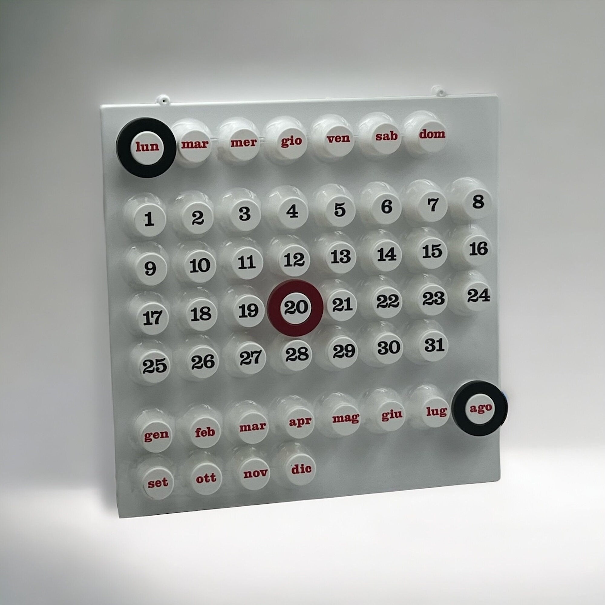 White Perpetual Ring-a-Date Calendar in Italian design, available in white, green, and yellow — a stylish, eco-friendly wall calendar for modern interiors.