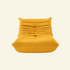 Yellow velvet Togo-style sofa chair – low, frameless design with plush channel tufting