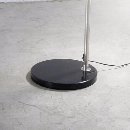 Aura Arc Floor Lamp, a modern arc floor lamp with a curved silhouette for living rooms, close-up detail