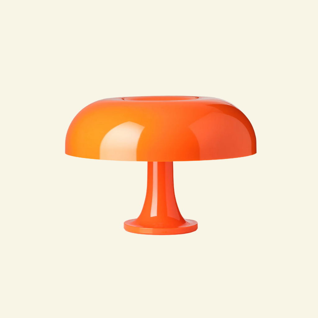 Bella table lamp in bold orange, mushroom-shaped design, retro-style lighting for modern interiors.
