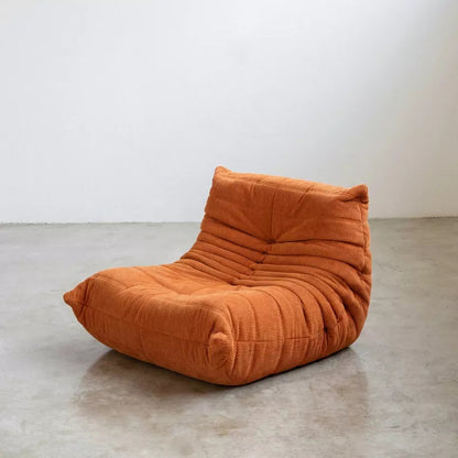 Handmade caterpillar sofa chair in corduroy orange – plush high-density sponge filling for ergonomic comfort
