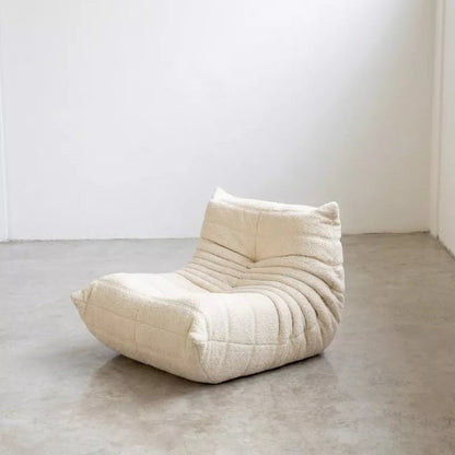 Handmade caterpillar sofa chair in boucle white – plush high-density sponge filling for ergonomic comfort