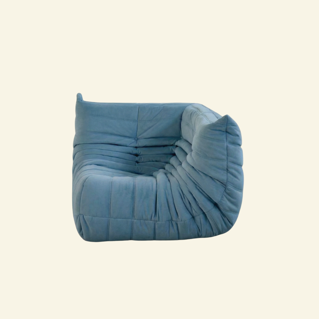Bruma Sofa Corner in light blue velvet suede on a beige background