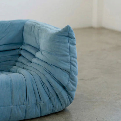 Bruma Sofa Corner in light blue velvet suede photographed from the side angle.