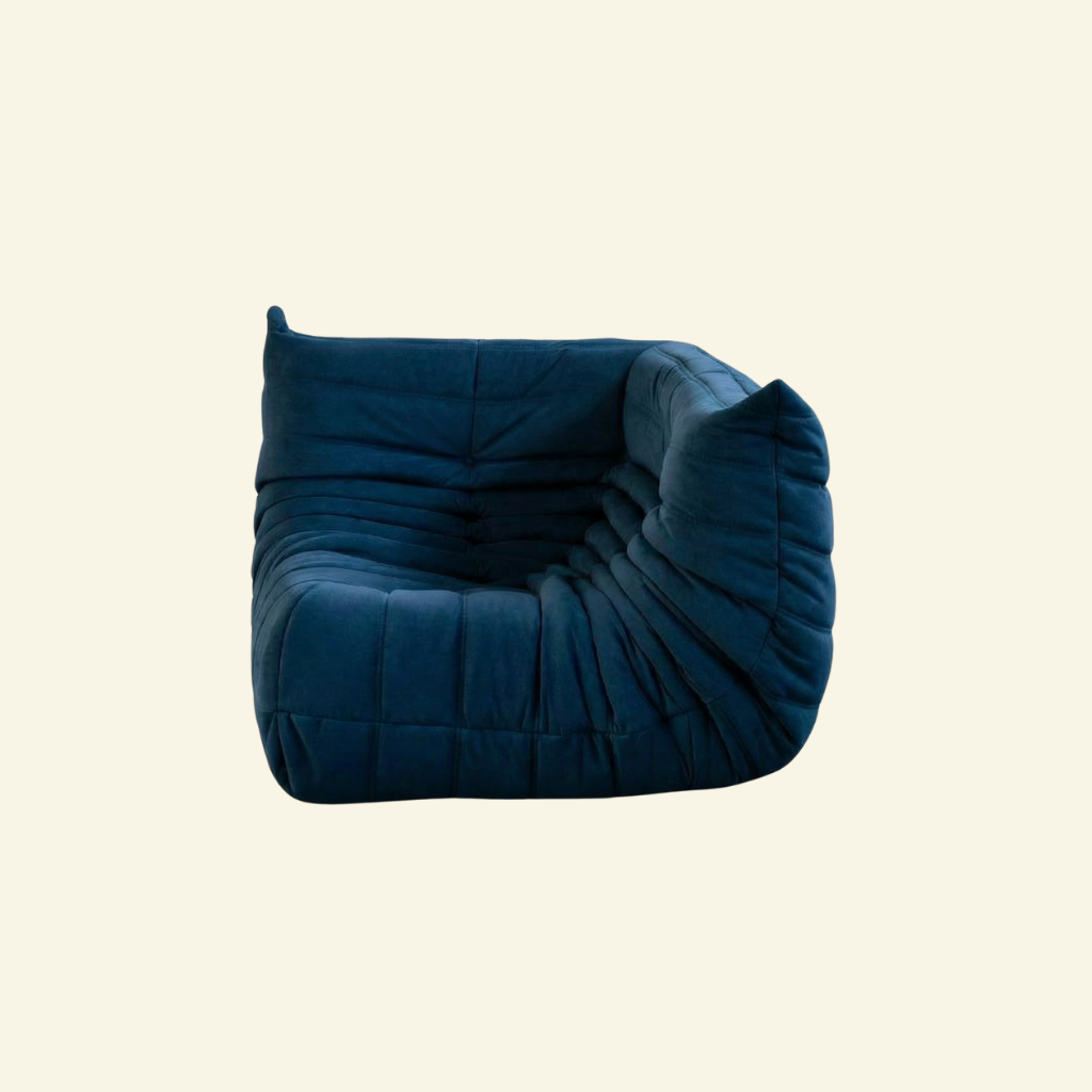 Bruma Sofa Corner in dark blue velvet suede on a beige background