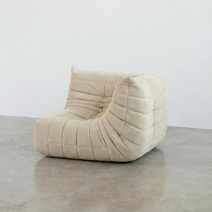 Bruma Sofa Corner in cream corduroy photographed from the front angle.