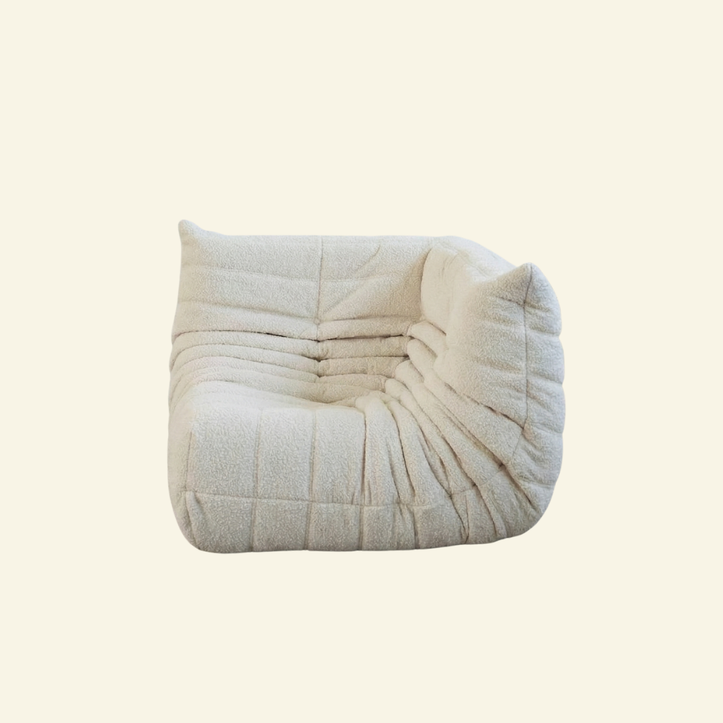 Bruma Sofa Corner in white bouclé on a beige background