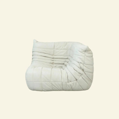 Bruma Corner Section in white leather on a beige background