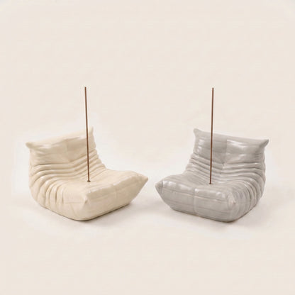 Cream and grey Bruma incense holder shown together to display both color variants.