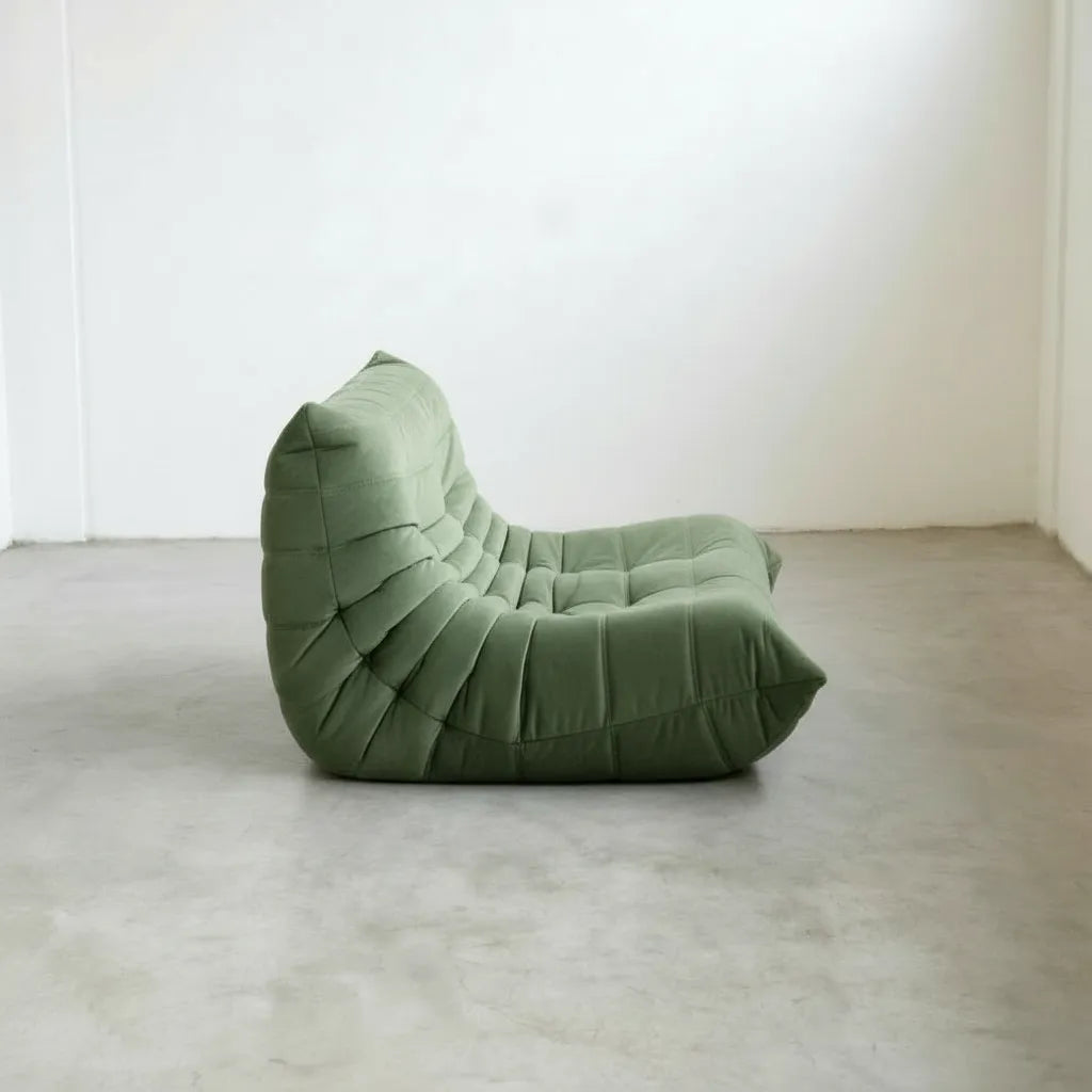 Matcha-green velvet Bruma 2-seater sofa for modern living rooms.