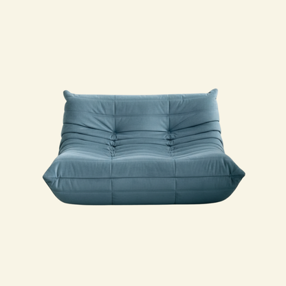 Bruma Sofa with Bruma silhouette – custom-made in light blue velvet by vibehaus