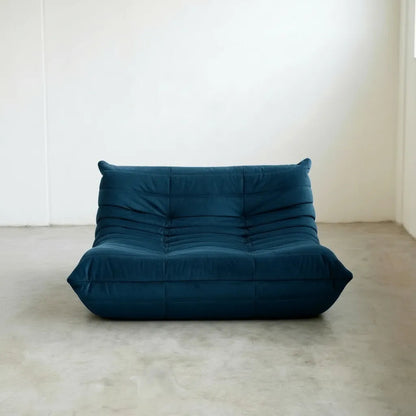 Bruma 2-seater Sofa in dark blue velvet suede with Bruma silhouette – custom-made by vibehaus