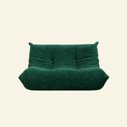Bruma 2-seater Sofa in dark green corduroy with Bruma silhouette – custom-made by vibehaus