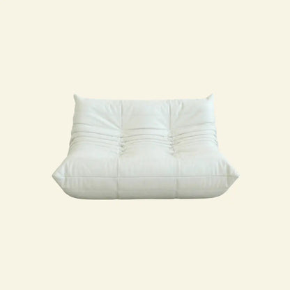 White Bruma sofa in leather on a light beige background