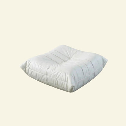 White Bruma ottoman on a beige background
