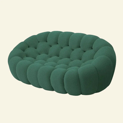 a green bubble sofa 2-seater replica dupe inspired by roche bobois on beige background