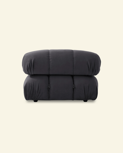 Black camaleonda replica chair on a beige background