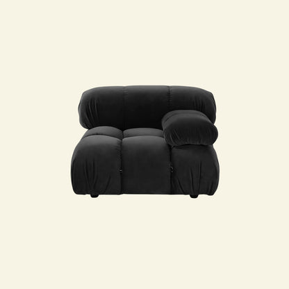 Camaleonda dupe section with armrest in dark grey velvet on a beige background