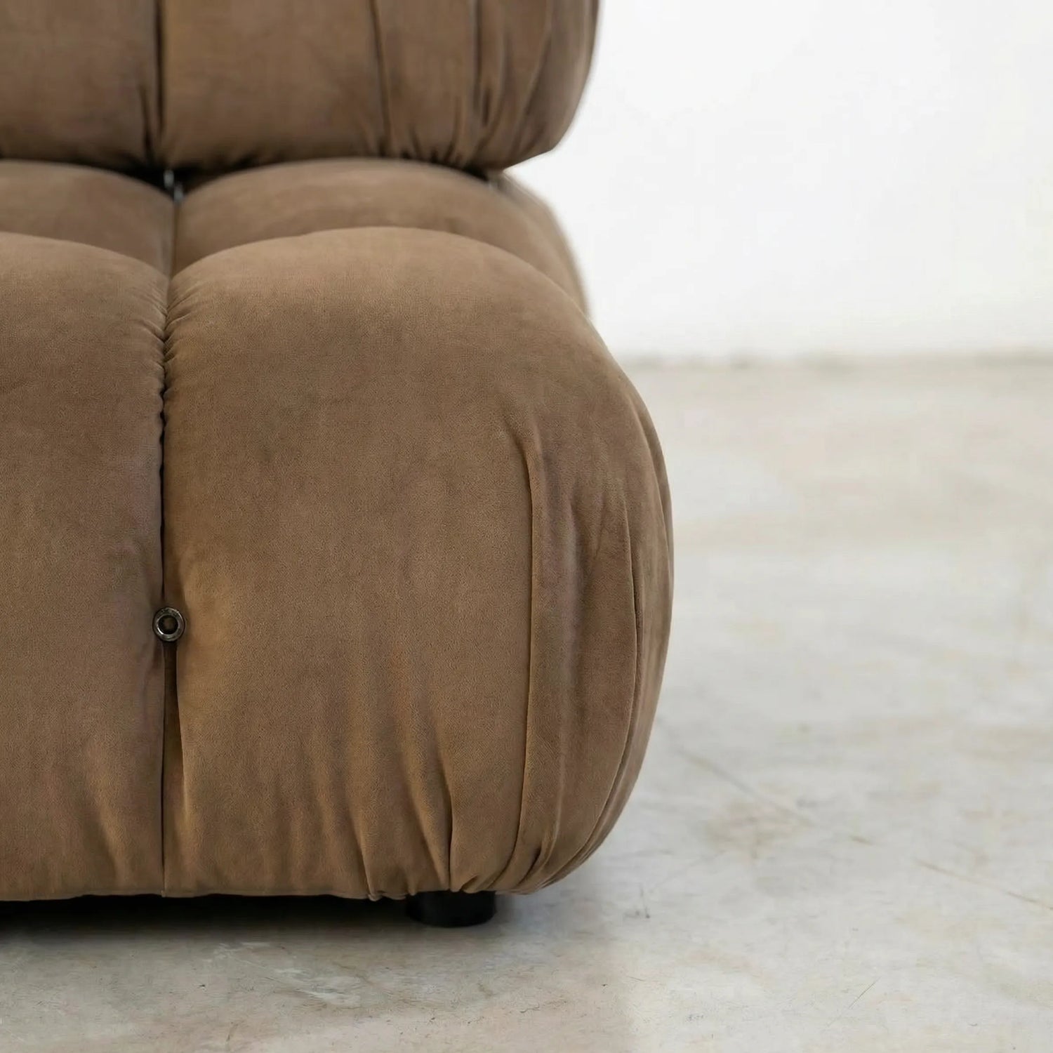 Camaleonda modular sofa section alternative with right armrest in brown velvet  on a light wooden floor