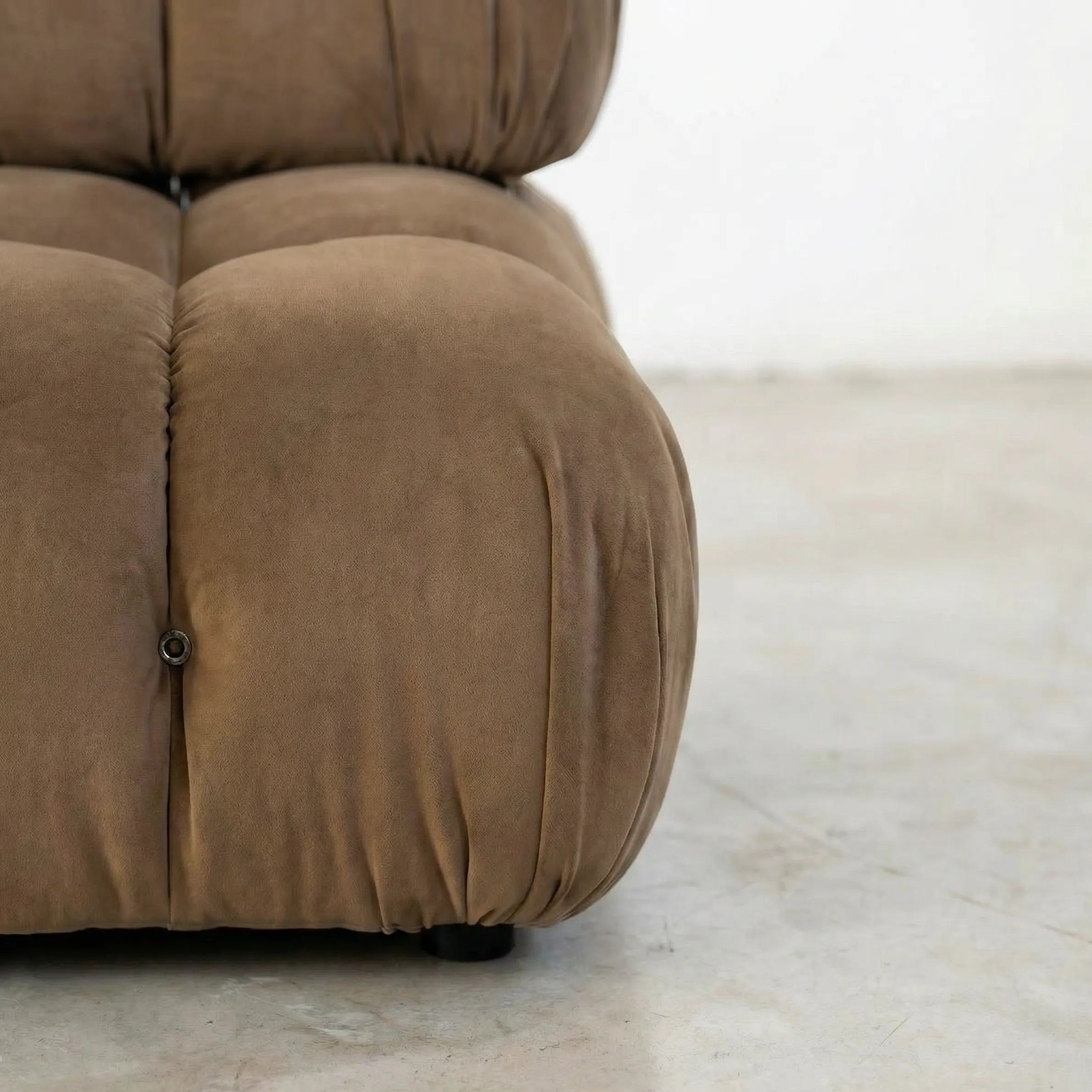 Camaleonda modular sofa section alternative with right armrest in brown velvet  on a light wooden floor