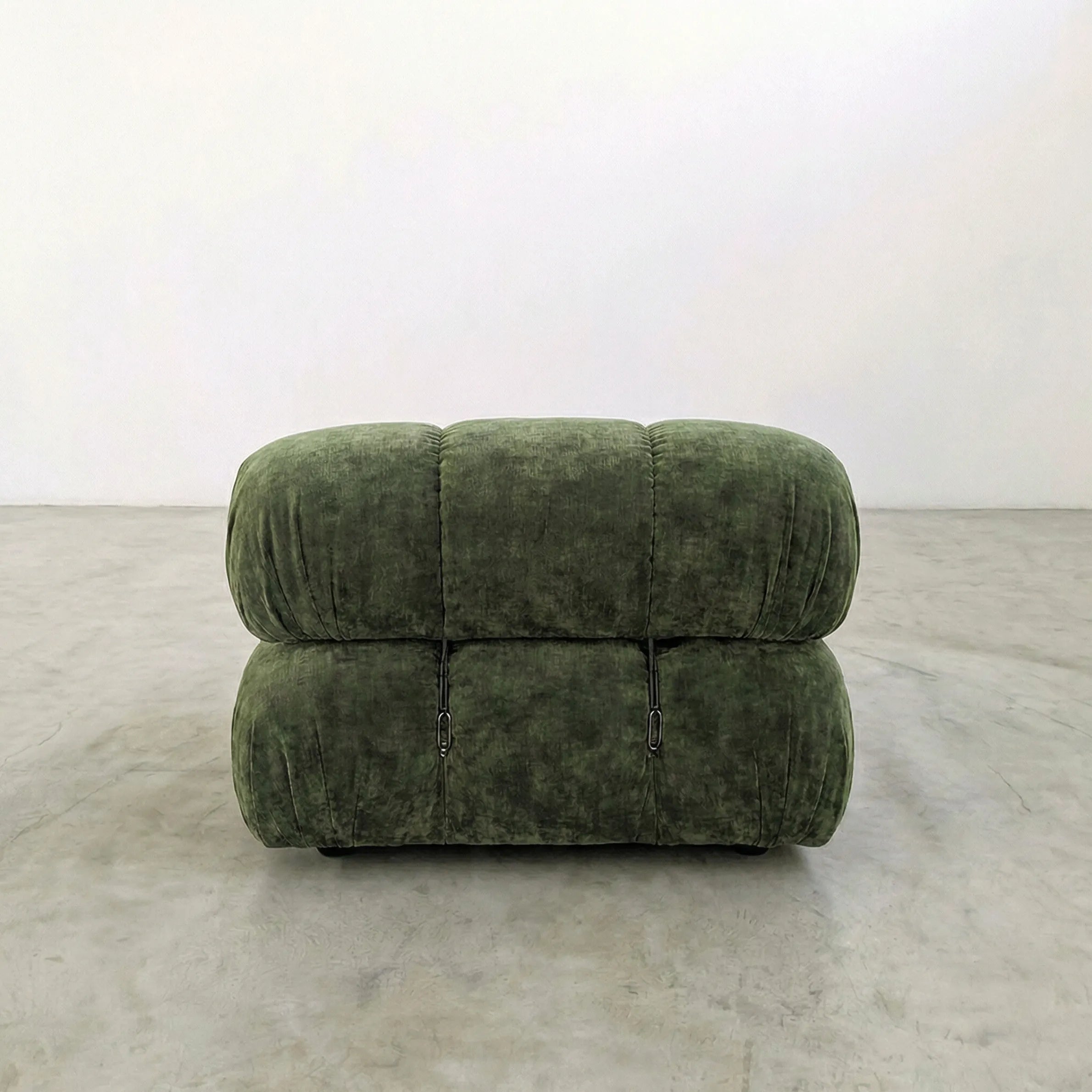 Camaleonda modular sofa section alternative with right armrest in green chenille on a gray floor with a white background