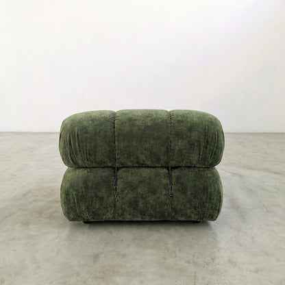 Camaleonda modular sofa section alternative with right armrest in green chenille on a gray floor with a white background