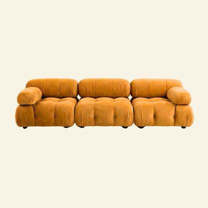 Camaleonda 3 seater modular sofa dupe in mustard velvet with tufted upholstery on a beige background