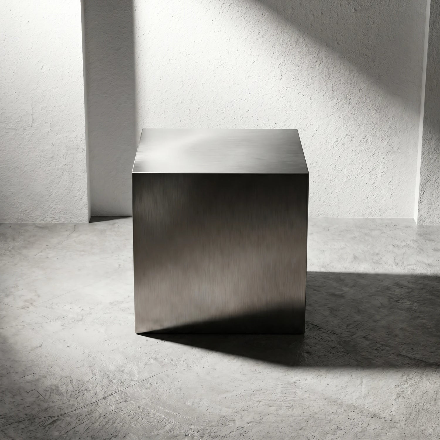 Front view of the Chrome Steel Cube Table styled as a minimalist end table with industrial modern appeal.