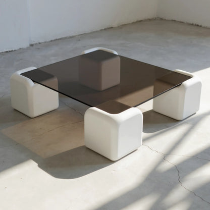 Elio Low Glass Coffee Table, a square glass coffee table with a low profile for modern lounge spaces, detail view