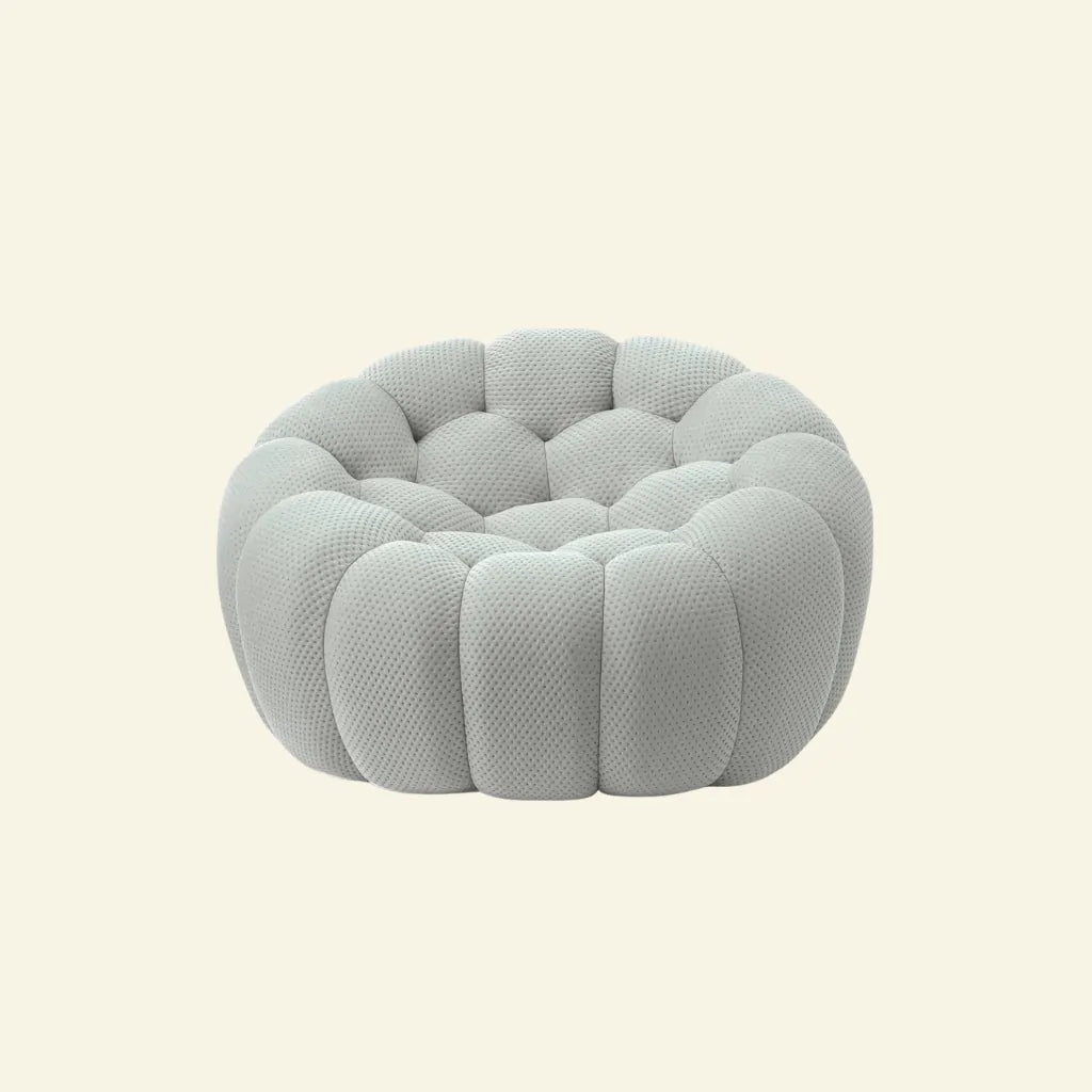 grey bubble chair replica on beige background