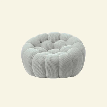 grey bubble chair replica on beige background
