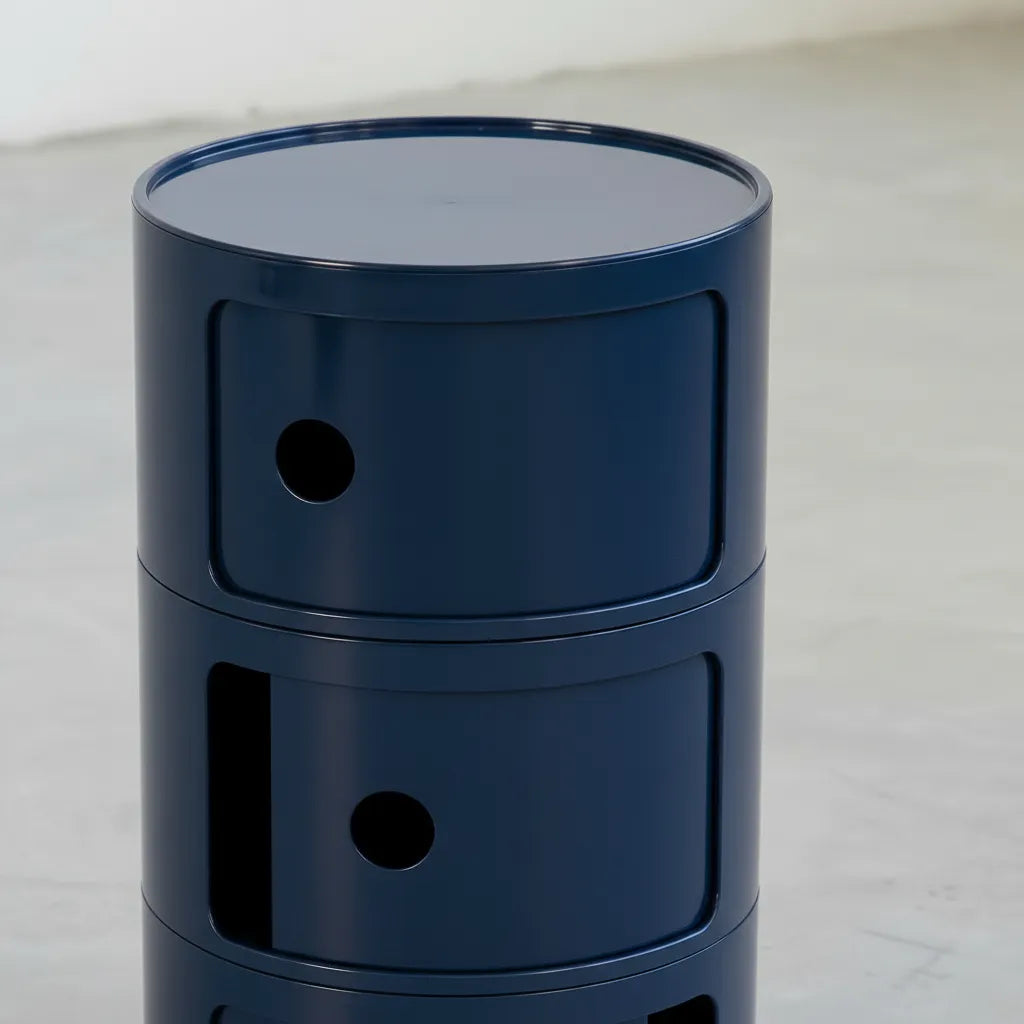 Navy Blue glossy round modular storage unit, Kartell Componibili dupe with three tiers in minimalist concrete studio