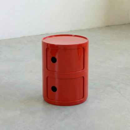 Red glossy round modular storage unit, Kartell Componibili dupe with two tiers in minimalist concrete studio