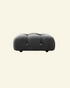 Camaleonda ottoman in black velvet replica with button-tufted detailing, shown in a high-resolution studio setting on a beige background.