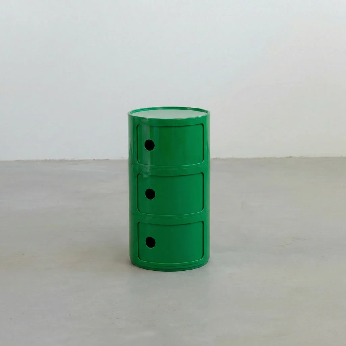 Rond modulair opbergmeubel in groen.