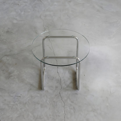 Orbit Round Glass Coffee Table, a round glass coffee table with a sculptural base for contemporary living rooms, detail view