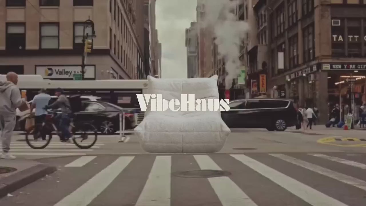 Animated montage of VibeHaus furniture and lamps floating over city street scenes.